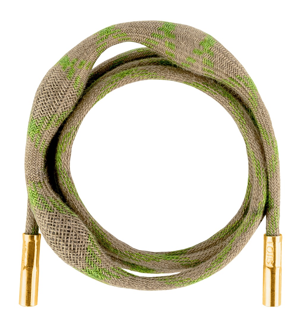 Green patterned fabric shoelaces with gold tips