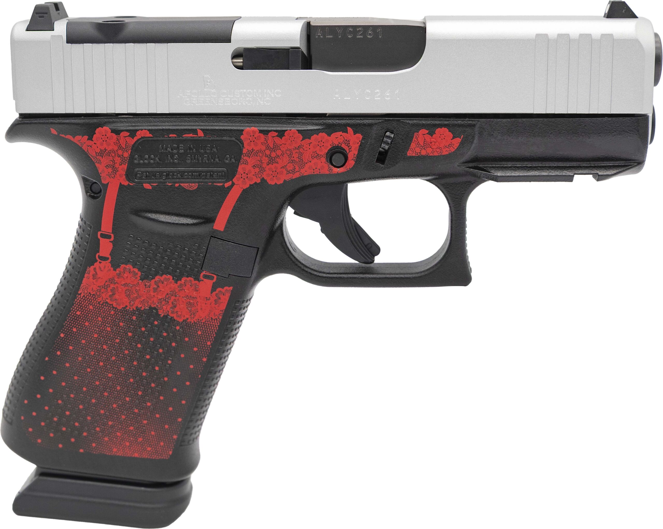 Handgun with red floral design on grip