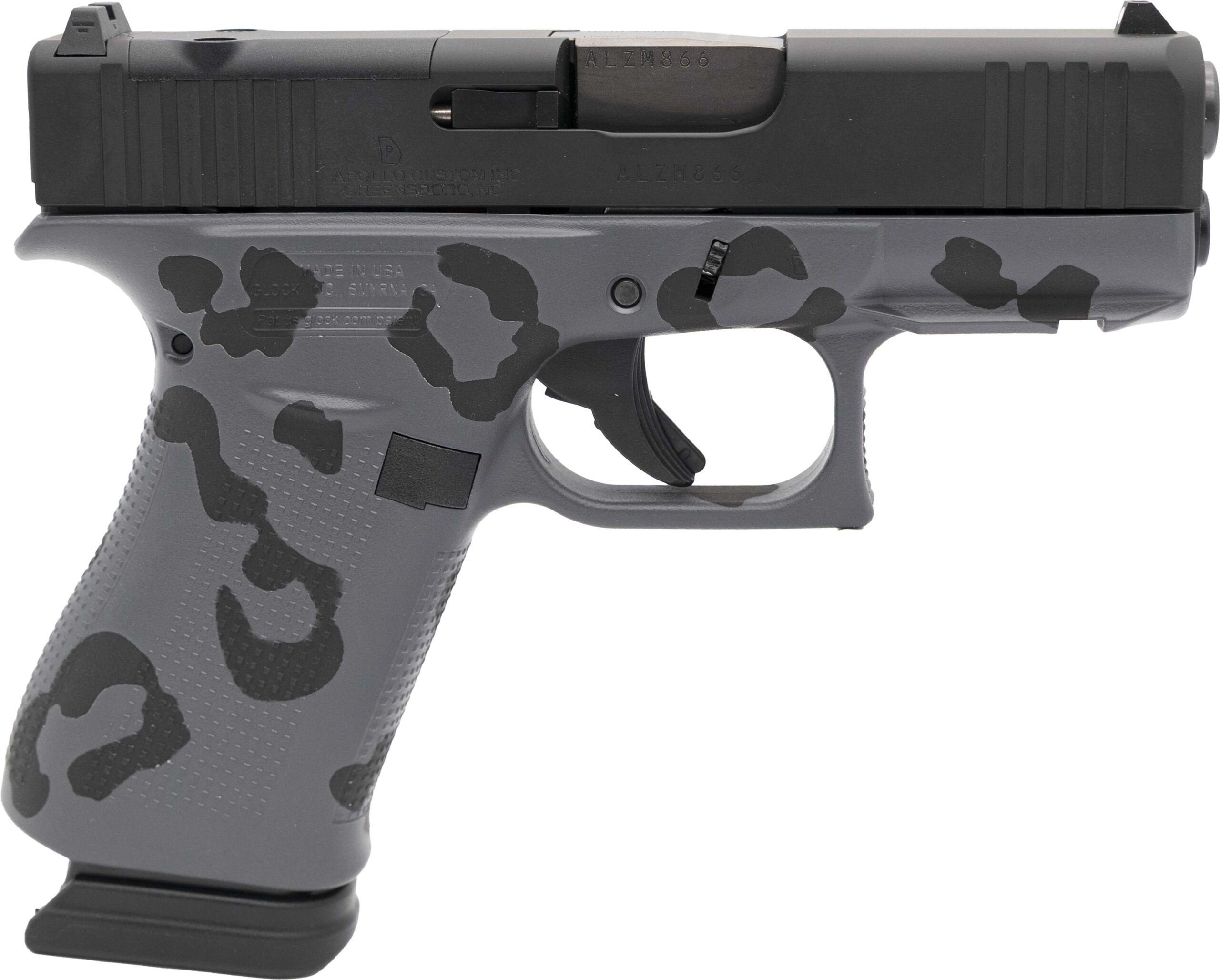 Gray and black semi-automatic handgun close-up