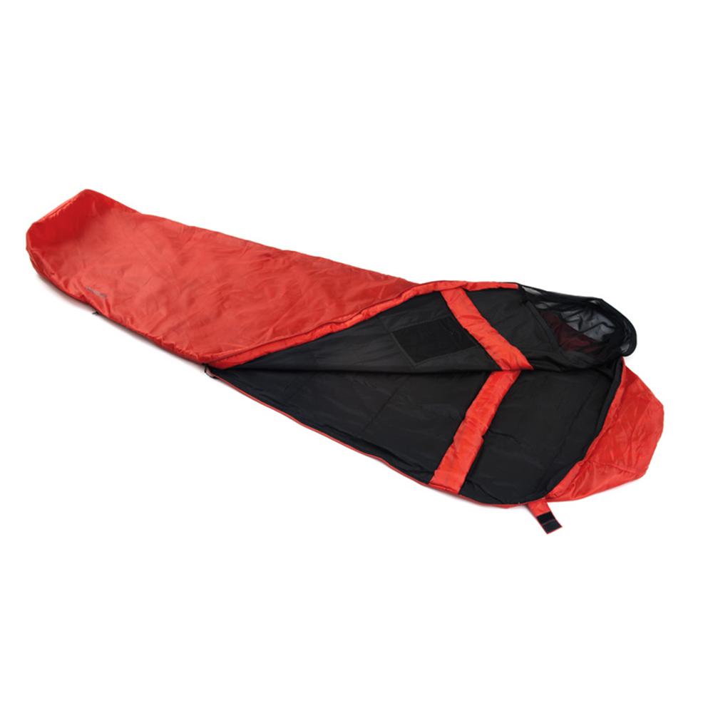 Red and black sleeping bag partially unzipped