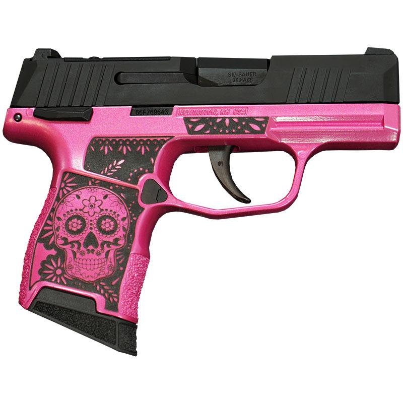 Pink handgun with decorative sugar skull design