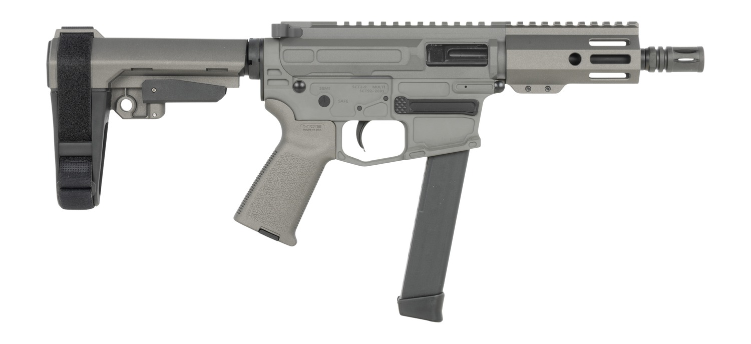 Gray compact firearm with brace and extended magazine