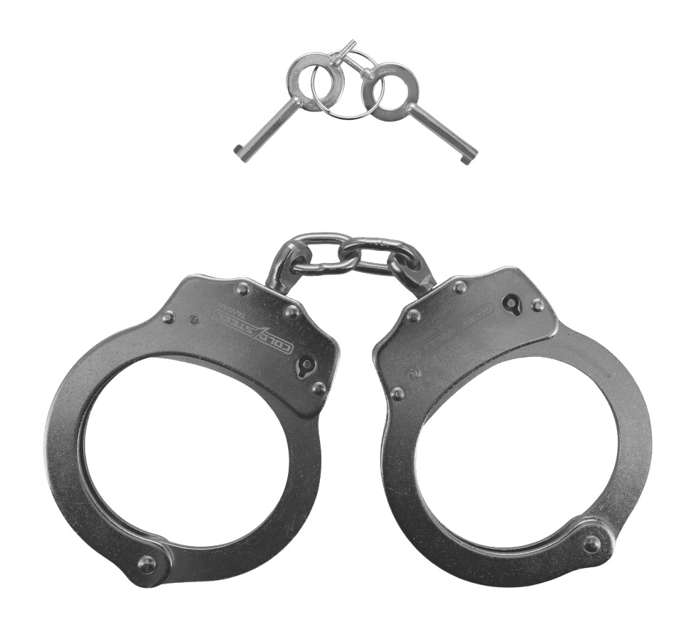 Metal handcuffs with two keys on white background