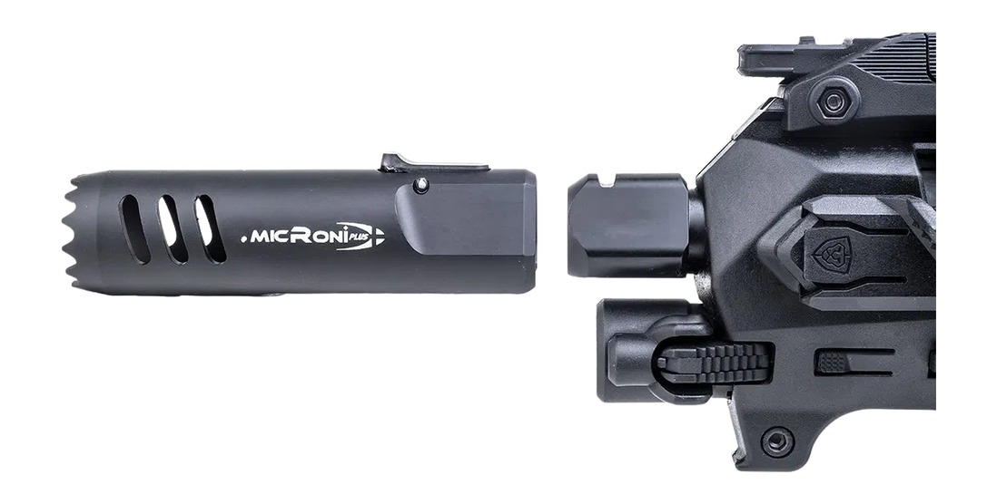 Black MicroN Plus muzzle device beside rifle barrel
