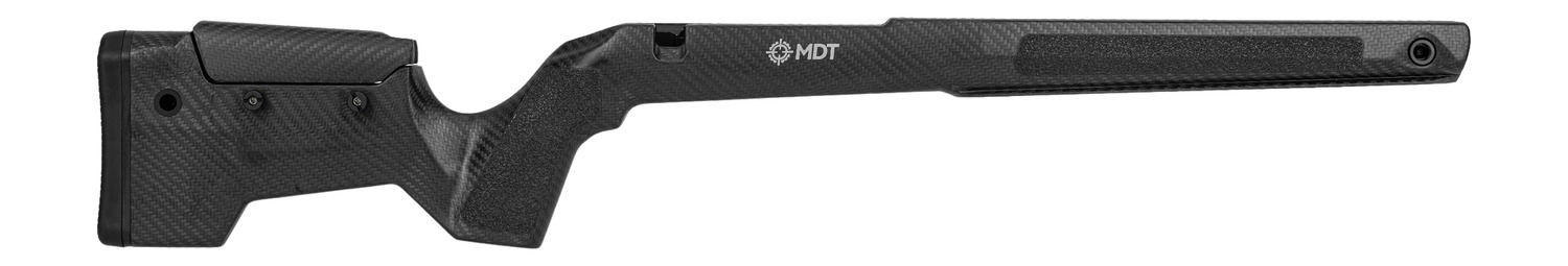 Black MDT carbon-fiber rifle stock shown in side profile