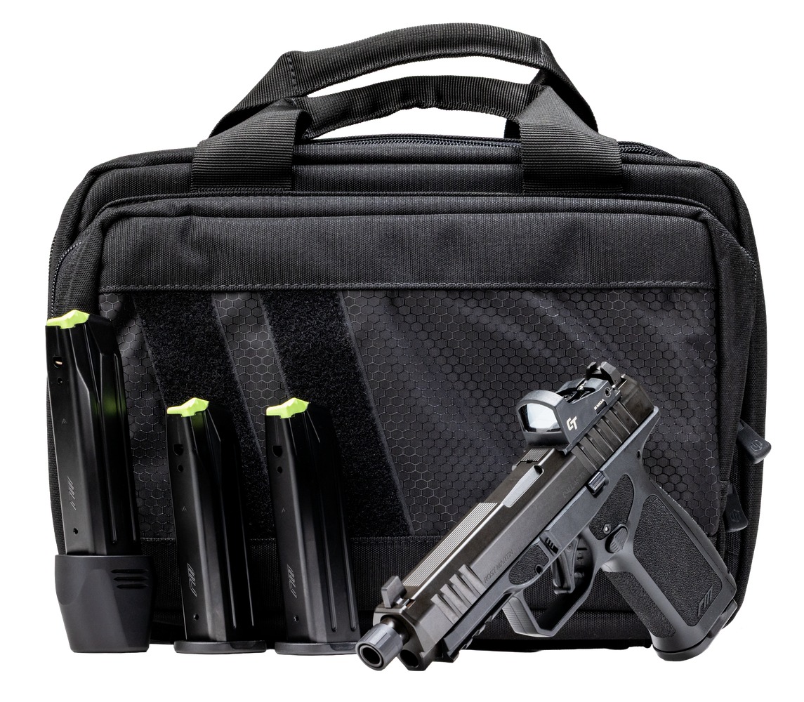 Handgun with magazines displayed against black carrying case