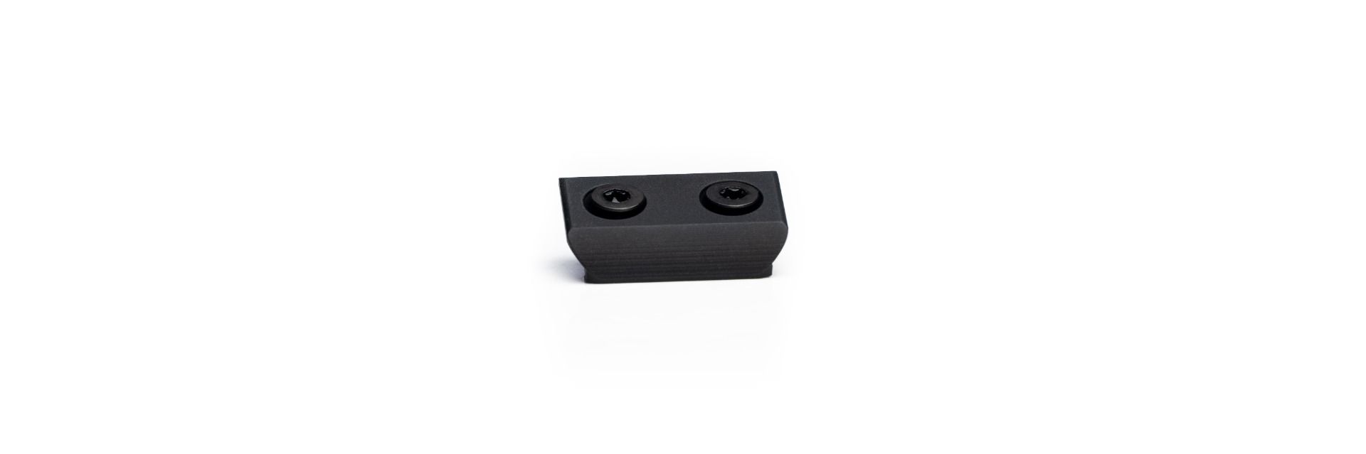 Black mounting bracket with two screws on white background