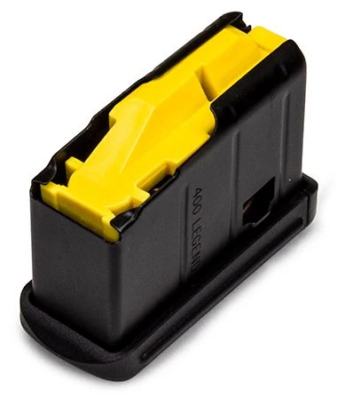 Black .308 Winchester rifle magazine with yellow follower