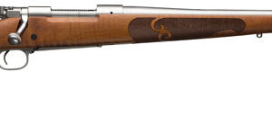 Wood-stock bolt-action rifle with long barrel