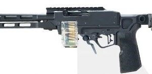 Black belt-fed machine gun with folding stock