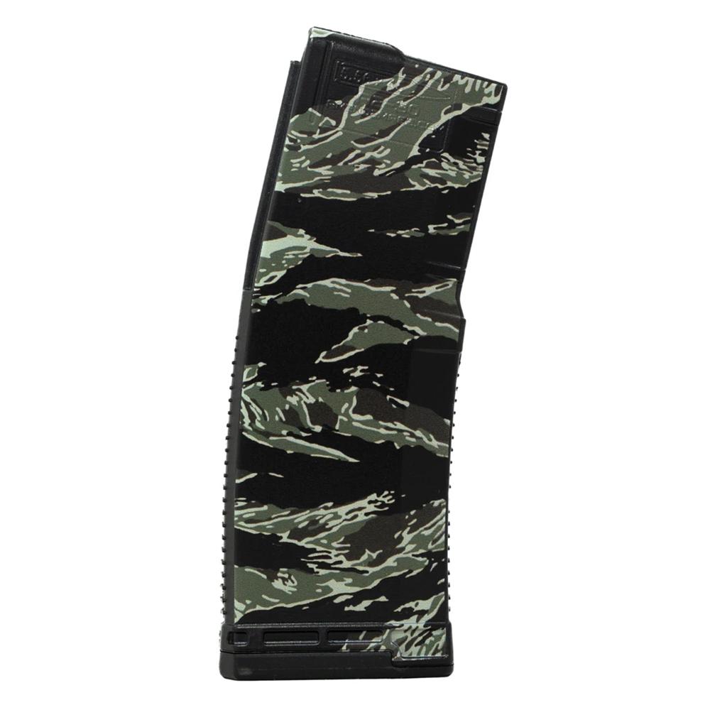 Camouflage-patterned curved rifle magazine on white background