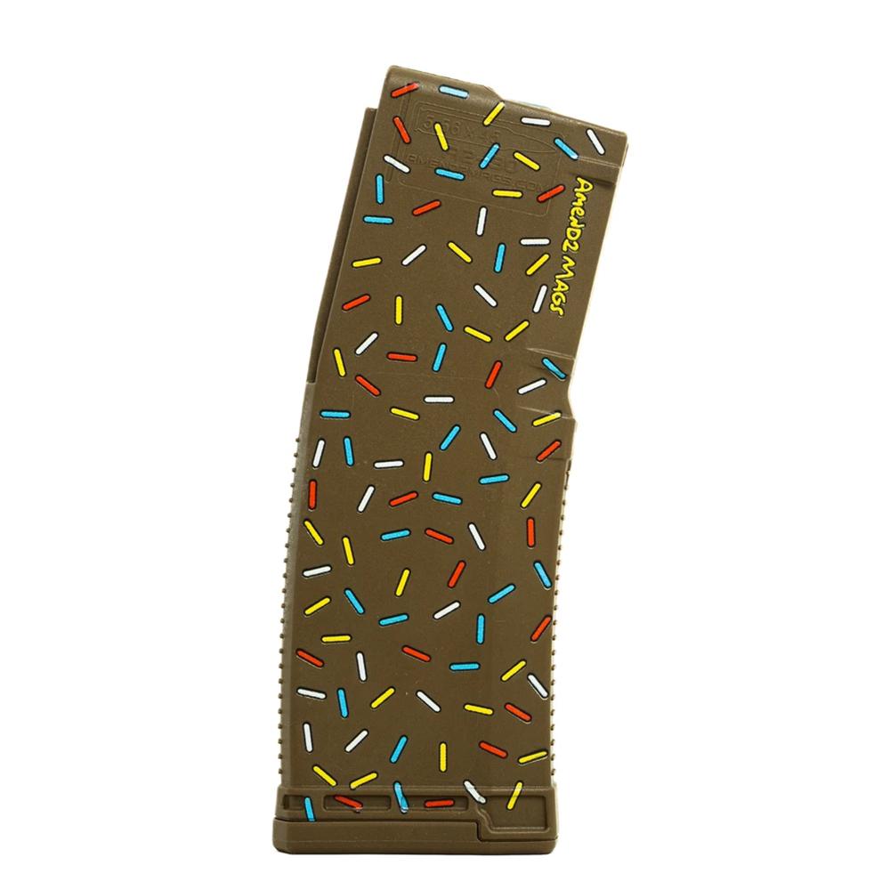 Olive-drab rifle magazine with colorful sprinkle pattern