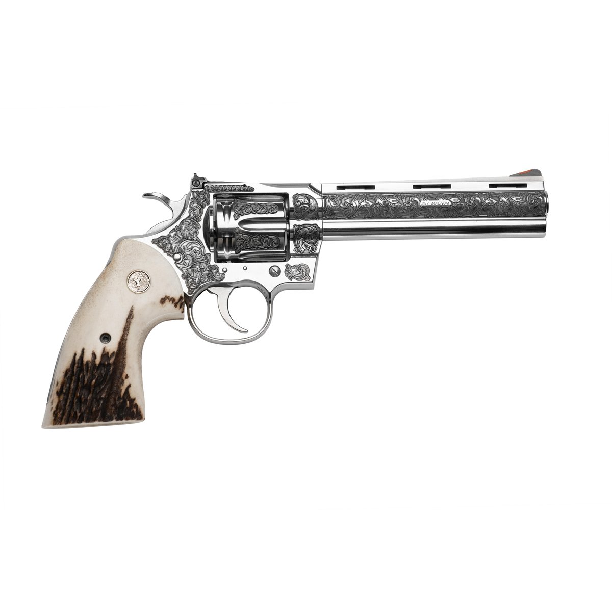 Engraved stainless steel revolver with antler-style grip