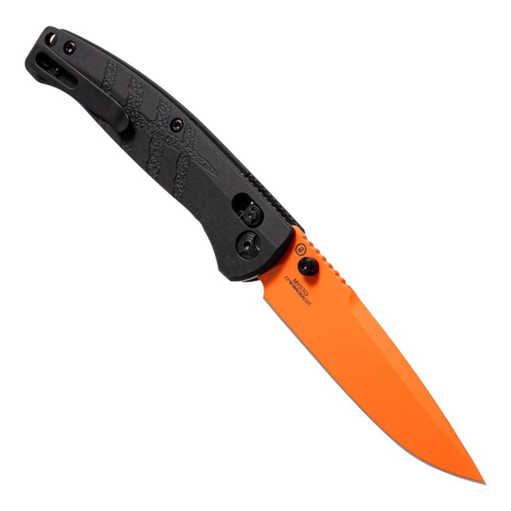 Black folding knife with bright orange blade