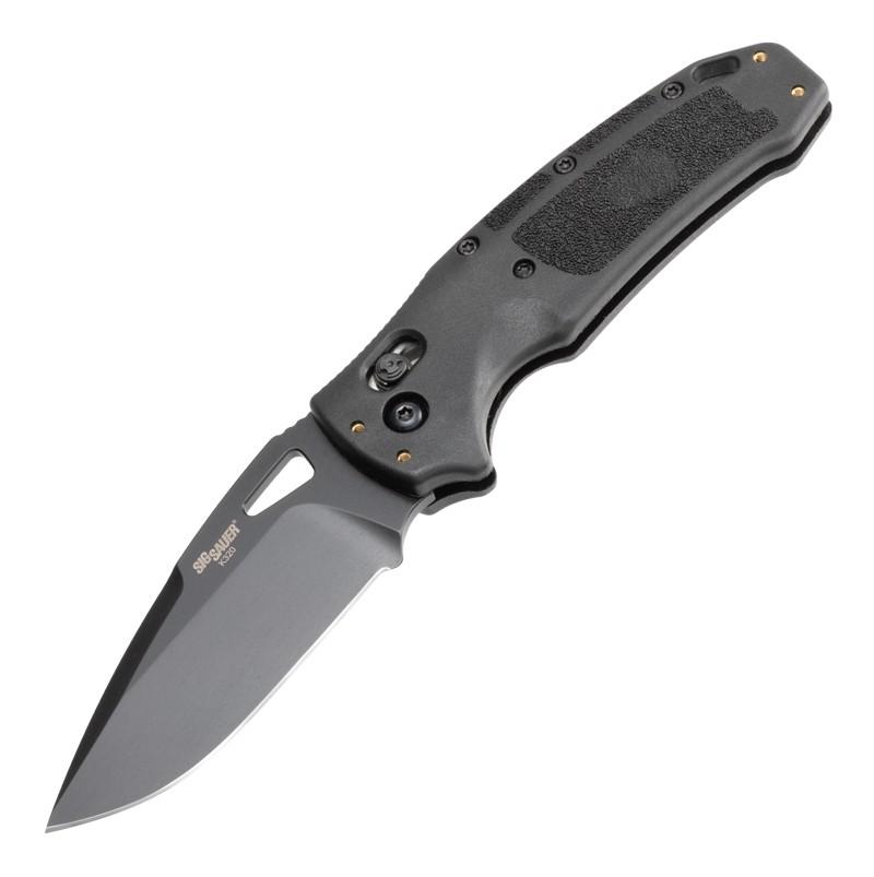 Black folding pocketknife with partially serrated drop-point blade