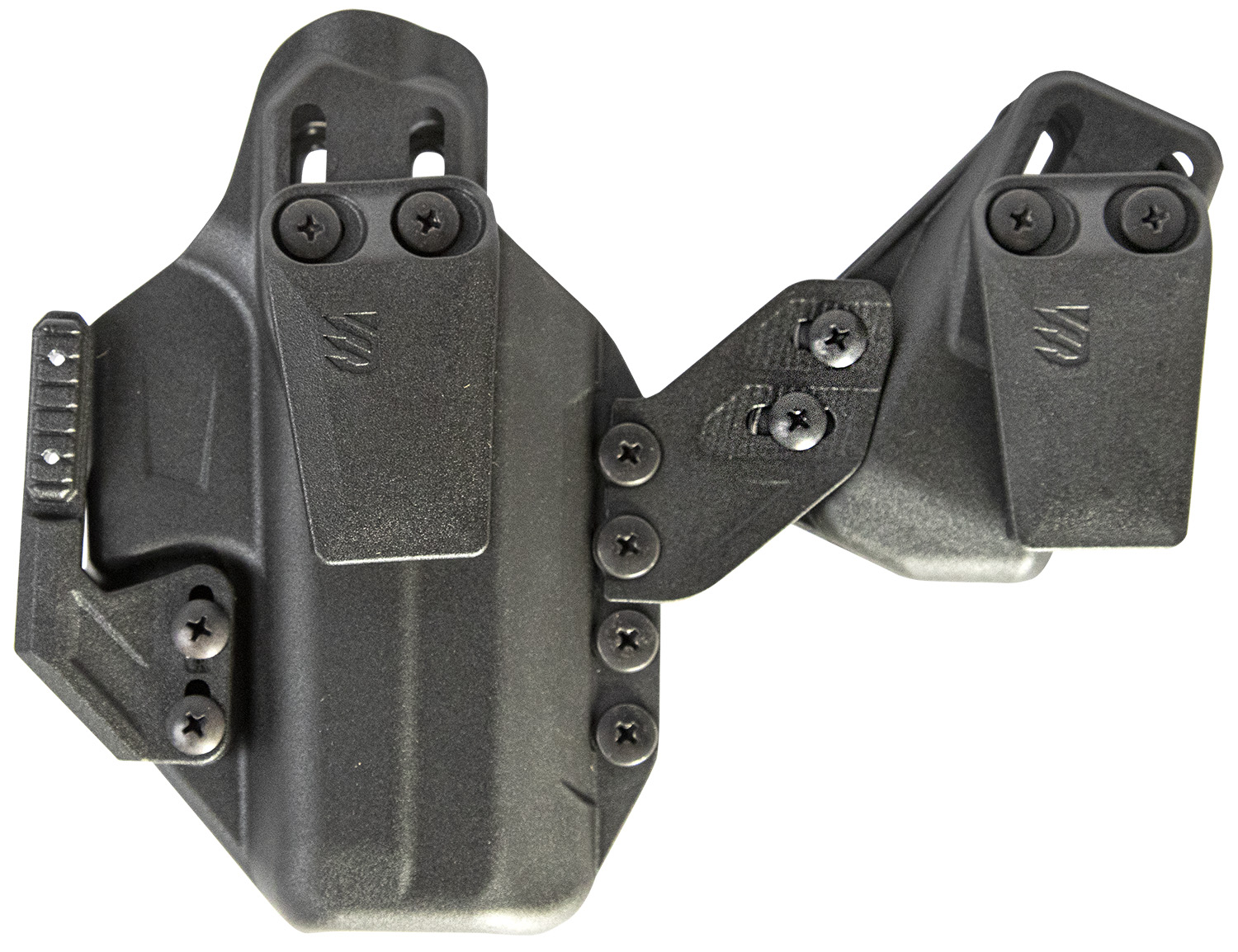 Black molded handgun holster with attached magazine carrier