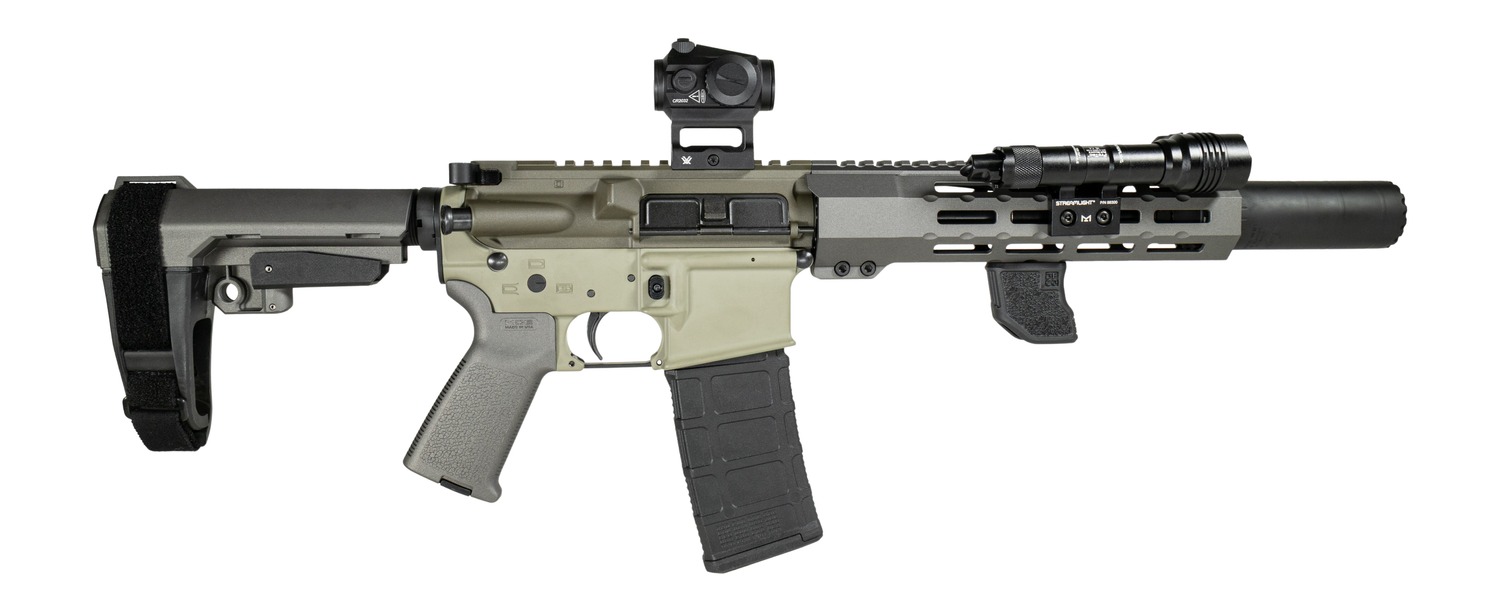 Compact AR-style rifle with optic, flashlight, and suppressor