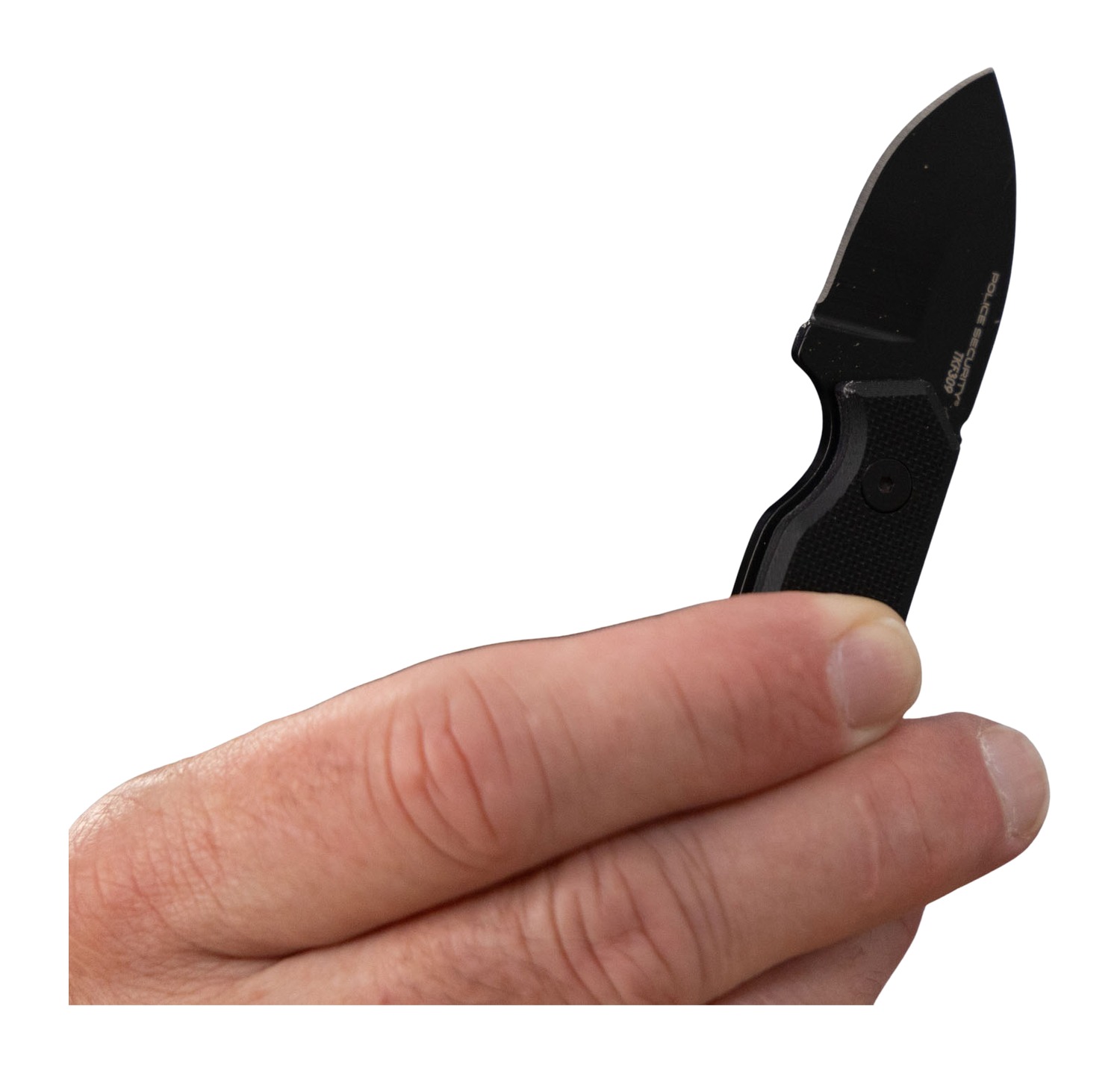 Hand holding a black folding pocketknife