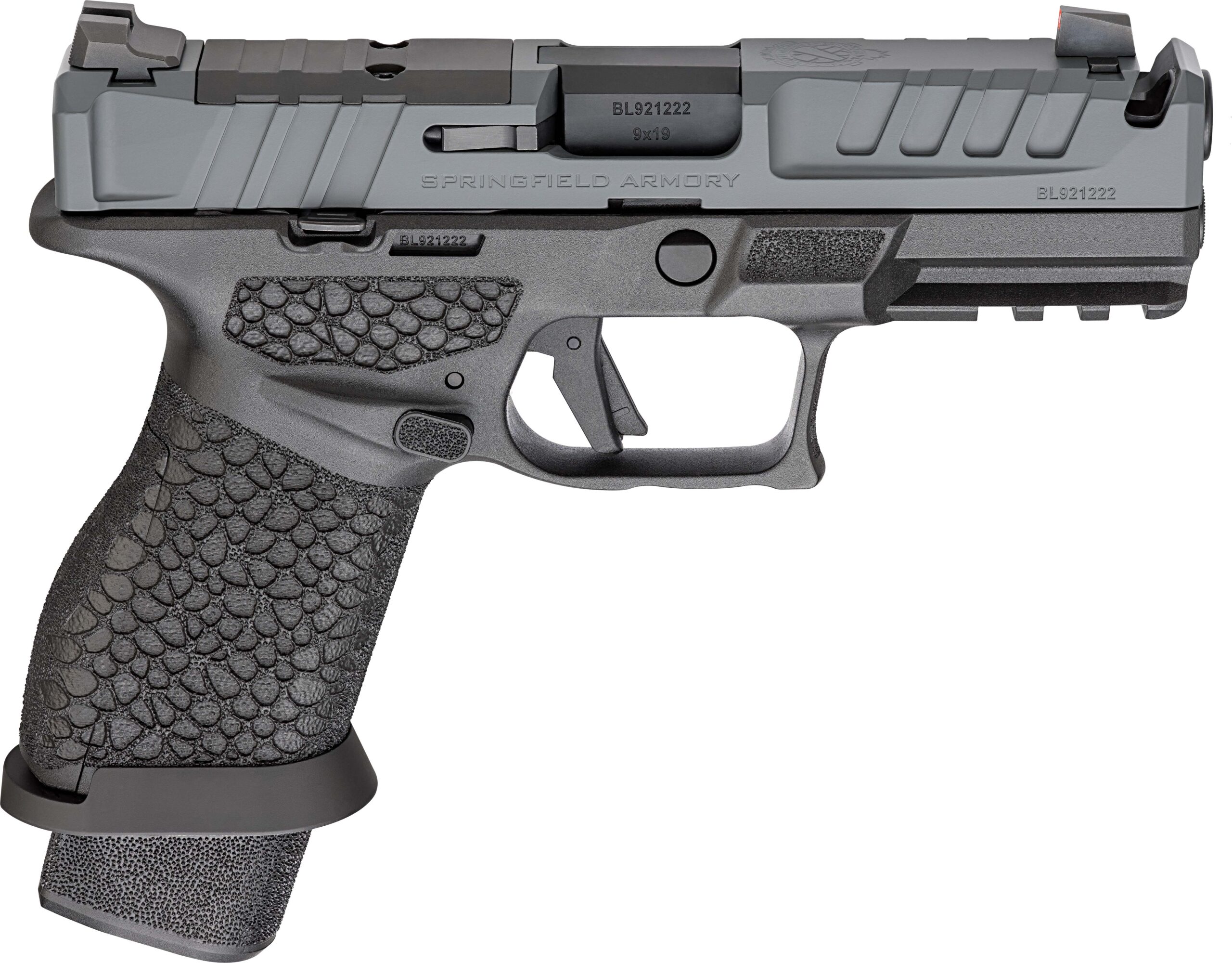 Close-up of Springfield Armory pistol held in gloved hand