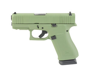 Olive green compact semi-automatic handgun on white background