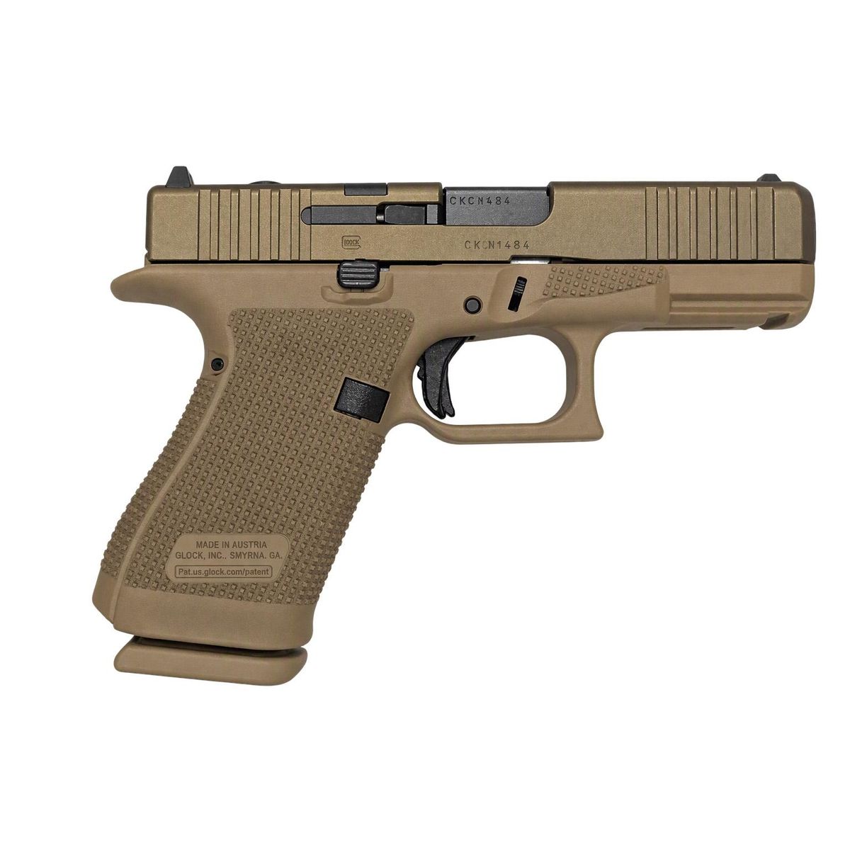 Tan Glock semi-automatic pistol on a white background