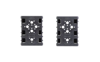 Two black plastic mounting plates with circular vent patterns